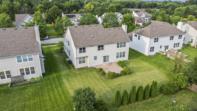 drone / aerial view with a residential view