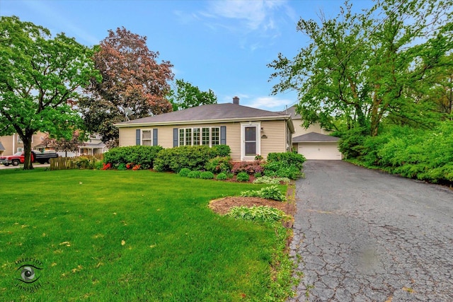 27W213 Manchester Rd, Winfield, IL 60190 - single story home featuring a front lawn, a chimney, and a garage