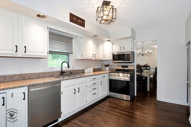 27W213 Manchester Rd, Winfield, IL 60190 - kitchen with stainless steel appliances, a sink, a chandelier, and white cabinets
