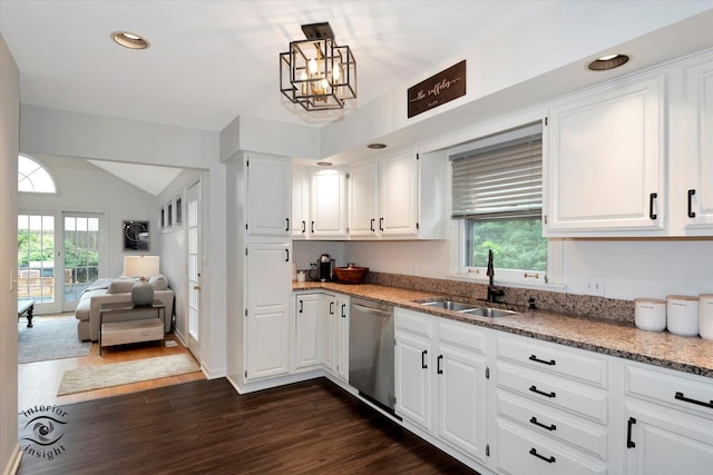 27W213 Manchester Rd, Winfield, IL 60190 - kitchen with a sink, stainless steel dishwasher, plenty of natural light, vaulted ceiling, and dark wood-style flooring