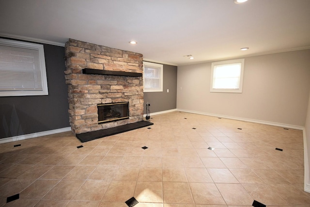 unfurnished living room with recessed lighting, a fireplace, crown molding, light tile patterned floors, and baseboards