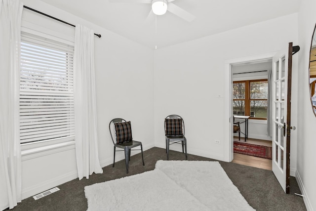 bedroom with visible vents, baseboards, and carpet