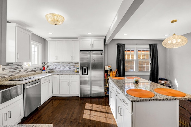 11551 S Justine St, Chicago, IL 60643 - kitchen featuring appliances with stainless steel finishes, dark wood-style floors, backsplash, recessed lighting, and white cabinets