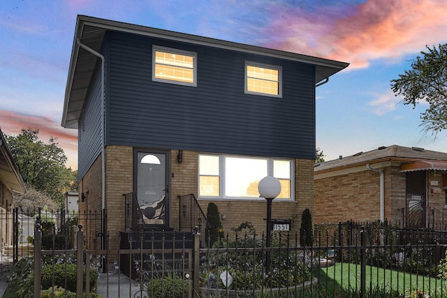 11551 S Justine St, Chicago, IL 60643 - view of front of house featuring brick siding, a fenced front yard, and a gate