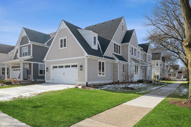 view of side of home featuring a shingled roof, concrete driveway, a garage, a lawn, and a residential view