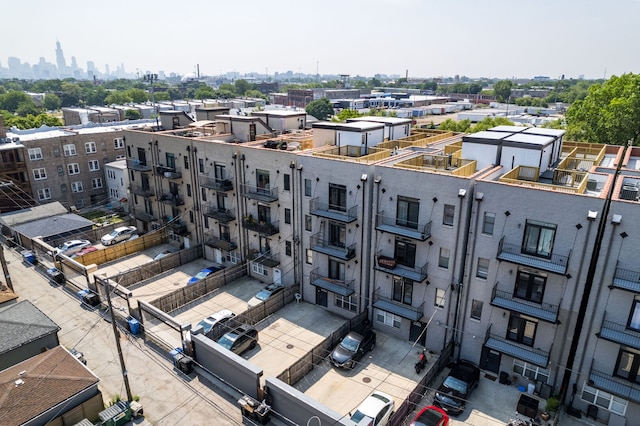 birds eye view of property with a view of city