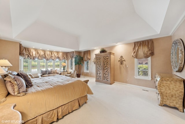 bedroom with visible vents, a raised ceiling, recessed lighting, carpet floors, and baseboards