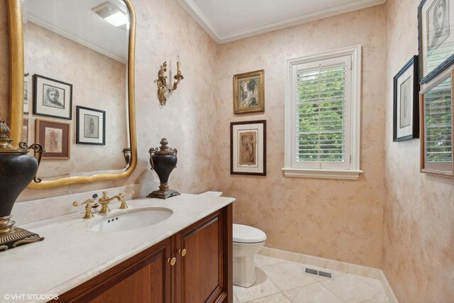 bathroom featuring visible vents, toilet, crown molding, tile patterned flooring, and vanity