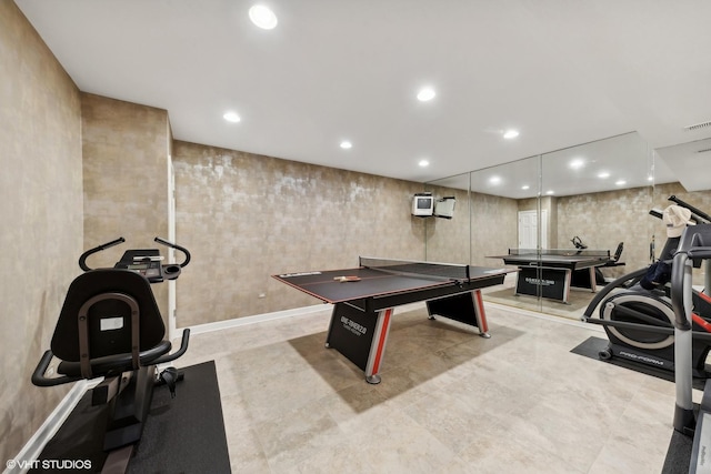 exercise area featuring recessed lighting