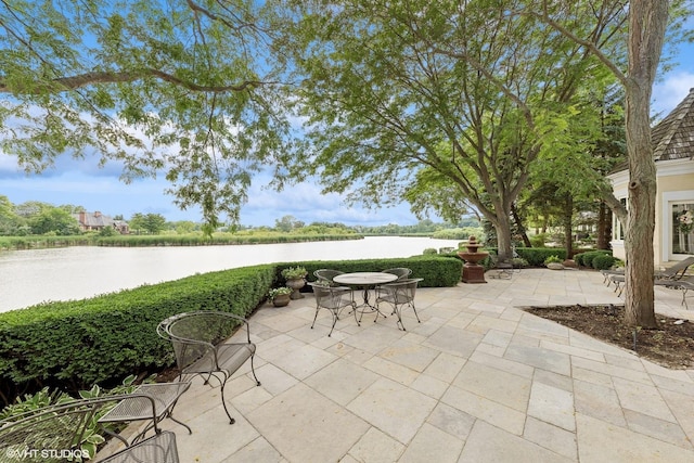 view of patio / terrace featuring a water view