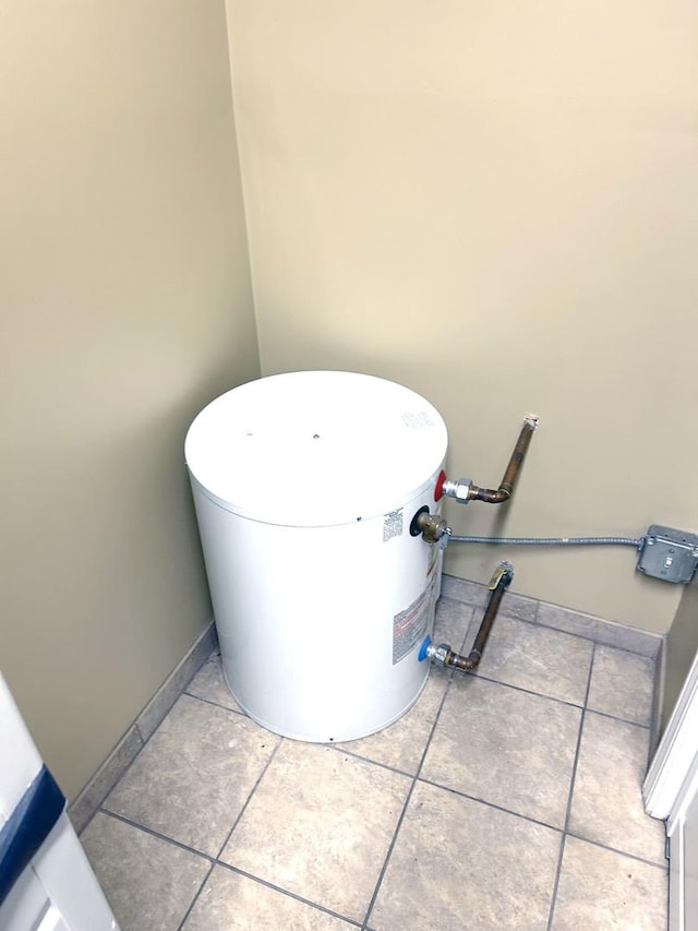 bathroom featuring tile patterned floors and baseboards