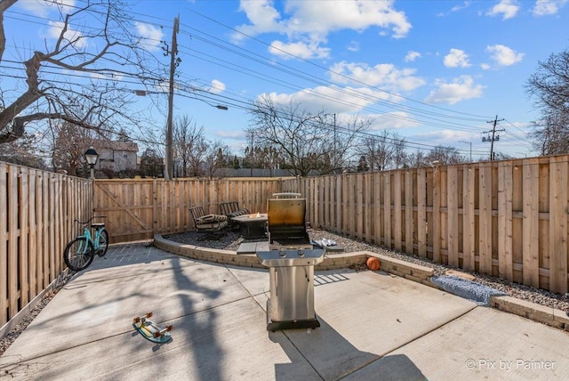 view of patio with a fenced backyard