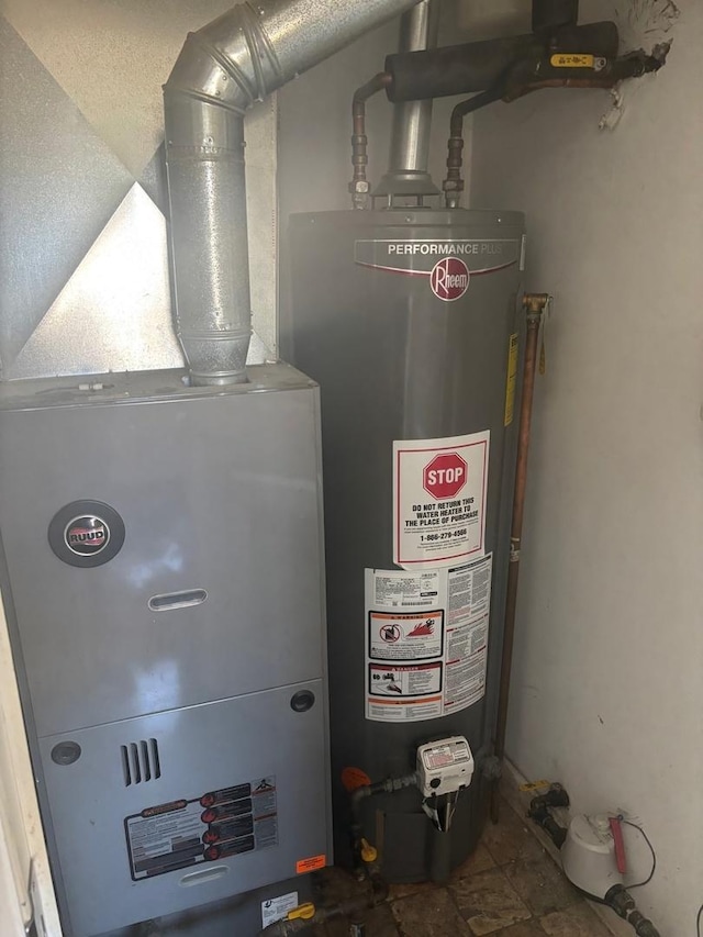 utilities with gas water heater and heating unit