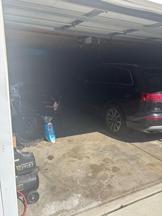 garage featuring a garage door opener