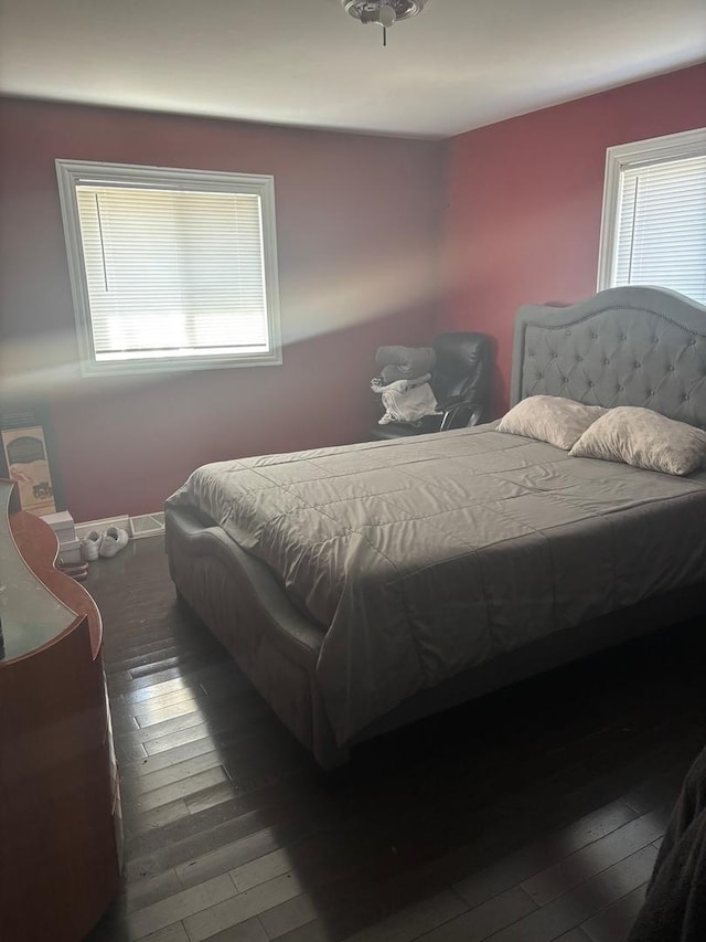 bedroom with wood-type flooring