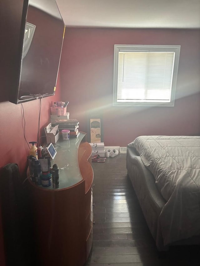 bedroom featuring wood-type flooring