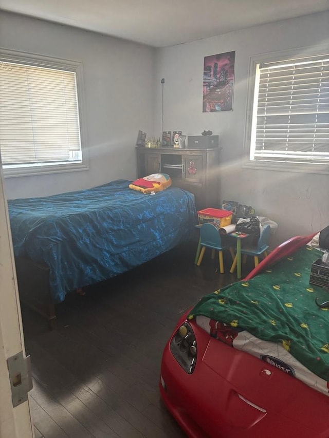 bedroom featuring hardwood / wood-style floors