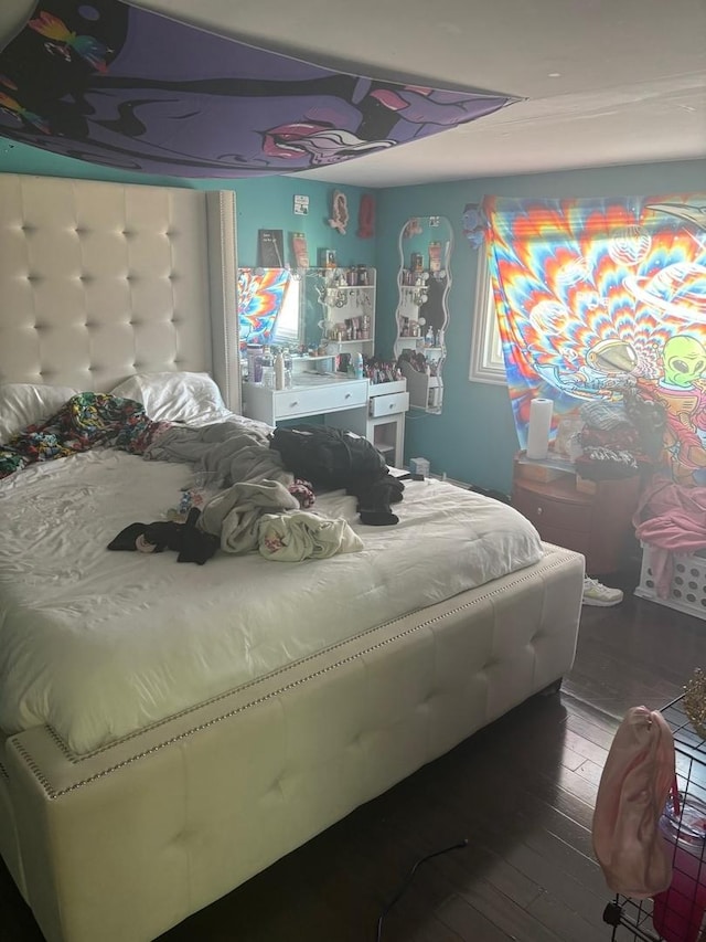 bedroom featuring wood-type flooring