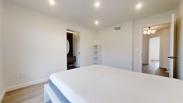 1904 Mullikin Dr, Champaign, IL 61822 - bedroom featuring wood finished floors, recessed lighting, baseboards, and visible vents