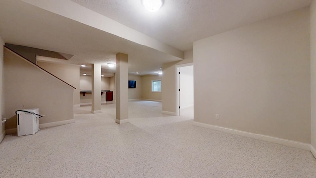 1904 Mullikin Dr, Champaign, IL 61822 - below grade area with baseboards and stairway