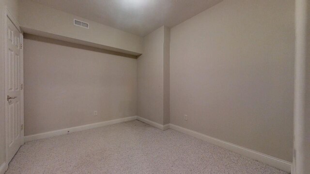 1904 Mullikin Dr, Champaign, IL 61822 - empty room with baseboards, visible vents, and light colored carpet