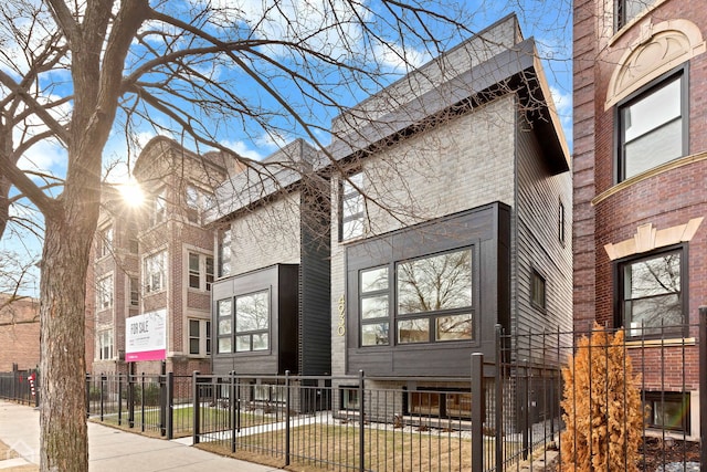 exterior space with a fenced front yard