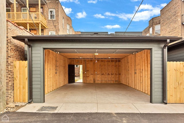 garage featuring fence