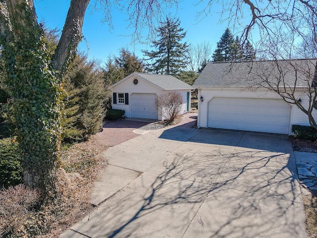 view of side of home with an outbuilding