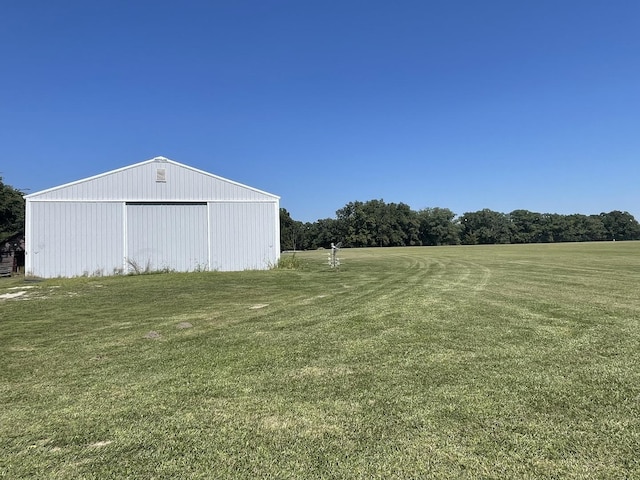 view of yard with an outbuilding and an outdoor structure