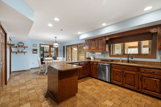 kitchen with dishwasher, a peninsula, recessed lighting, and a sink