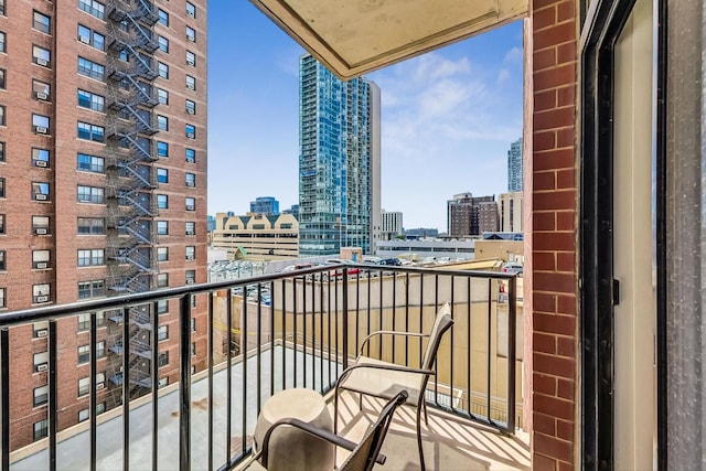 balcony featuring a view of city