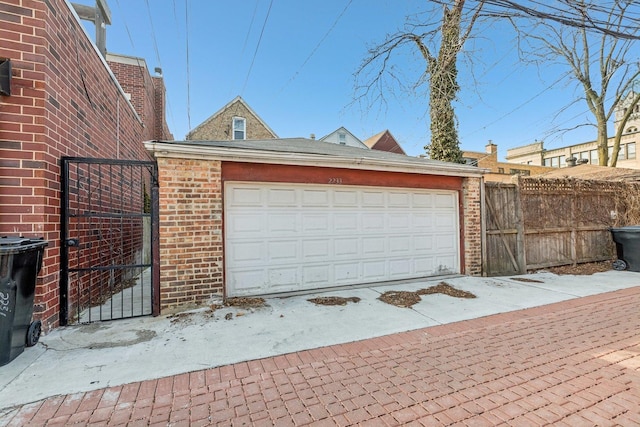 garage featuring fence