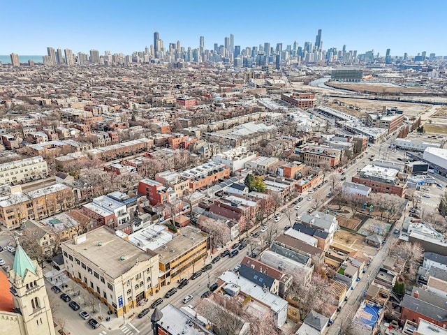 drone / aerial view featuring a city view