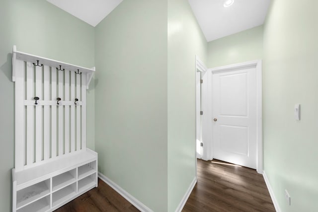 mudroom featuring baseboards and wood finished floors