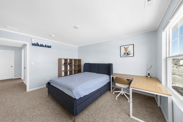 bedroom featuring visible vents, carpet, baseboards, and ornamental molding