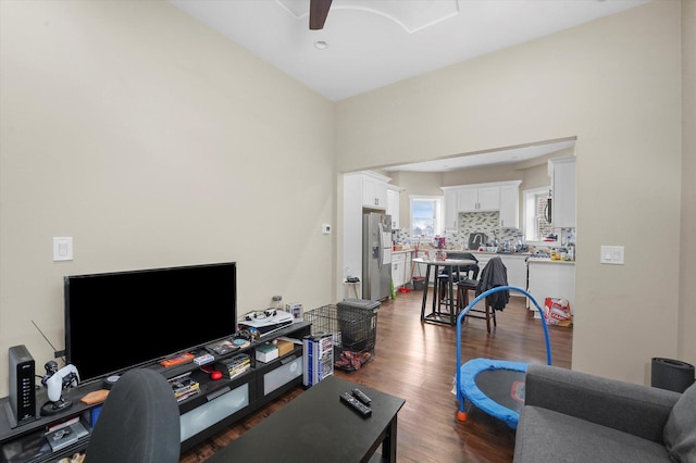 office space featuring dark wood finished floors and a ceiling fan