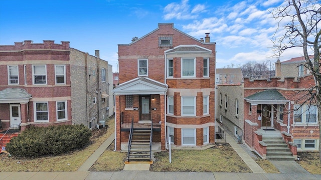 multi unit property featuring brick siding