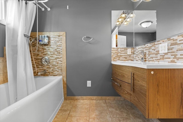 400 S 2nd St, Wapella, IL 61777 - bathroom featuring vanity, tasteful backsplash, shower / bathtub combination with curtain, baseboards, and a chandelier