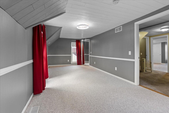 400 S 2nd St, Wapella, IL 61777 - bonus room featuring carpet flooring, baseboards, vaulted ceiling, and wood ceiling