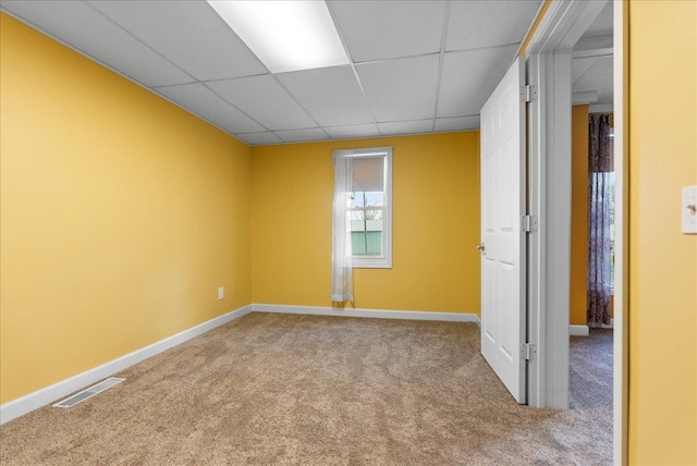 400 S 2nd St, Wapella, IL 61777 - carpeted spare room with a paneled ceiling and baseboards