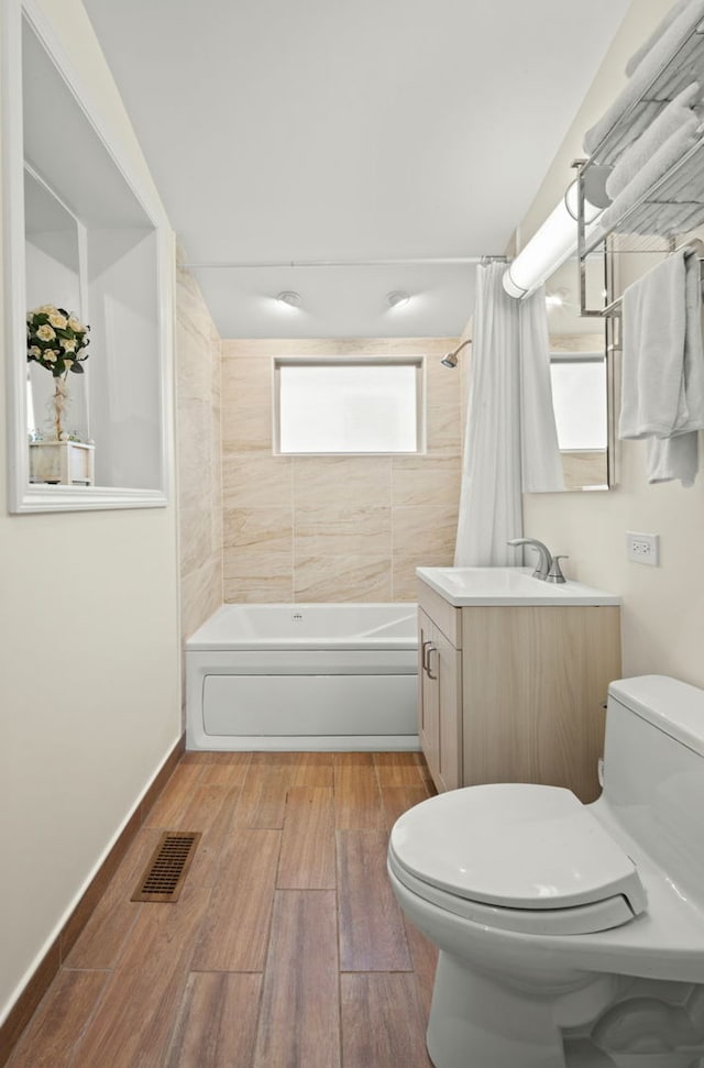 3119 W 83rd St, Chicago, IL 60652 - bathroom with toilet, shower / bath combo with shower curtain, wood finished floors, and vanity