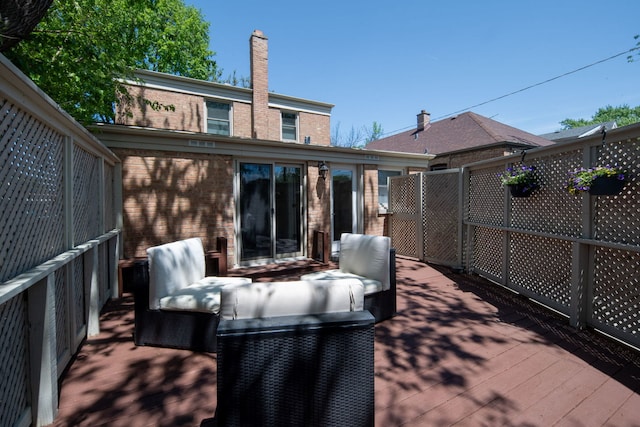 3119 W 83rd St, Chicago, IL 60652 - wooden deck with an outdoor living space and fence