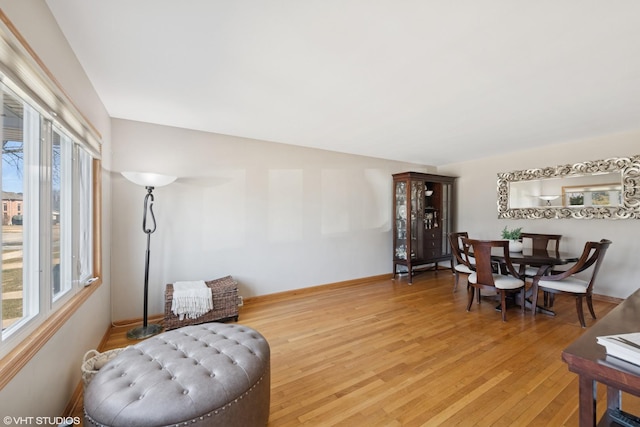 sitting room featuring wood finished floors and baseboards