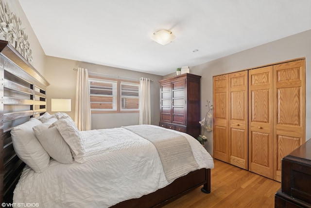 bedroom with light wood-type flooring