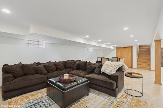 living area featuring stairway, light tile patterned floors, and recessed lighting