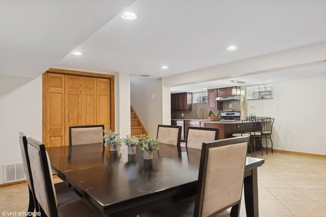 dining room featuring stairs, light tile patterned floors, recessed lighting, and visible vents