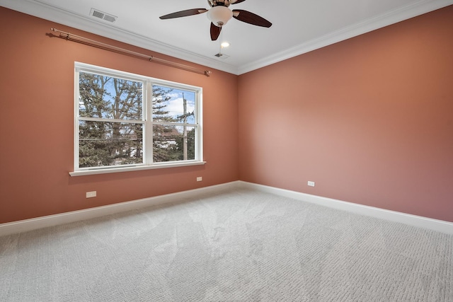 carpeted empty room with a ceiling fan, visible vents, baseboards, recessed lighting, and ornamental molding