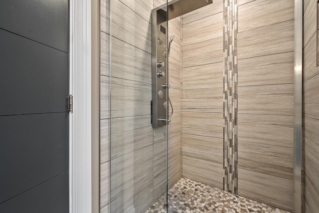 full bathroom with a shower stall