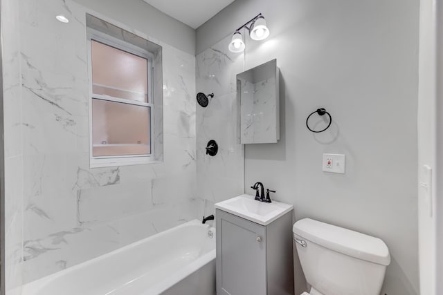 full bath featuring shower / bath combination, toilet, and vanity