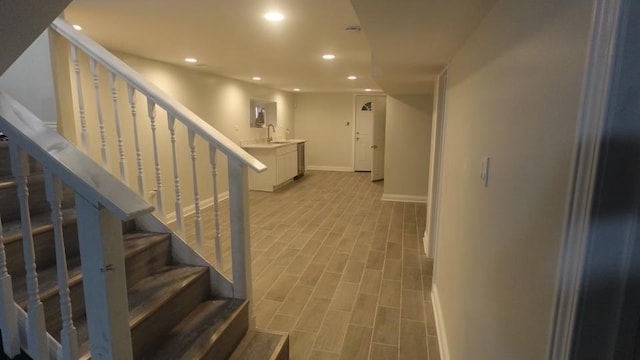 stairs featuring recessed lighting, indoor bar, baseboards, and wood tiled floor